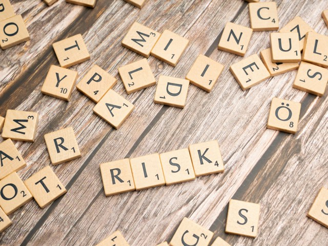 May 2026 Risk scrabble tiles (Unsplash/@markuswinkler/WkdzUQrKWys)