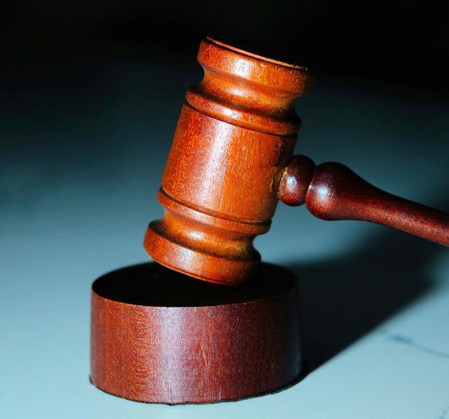 a brown gavel (unsplash.com/@wesleyphotography)